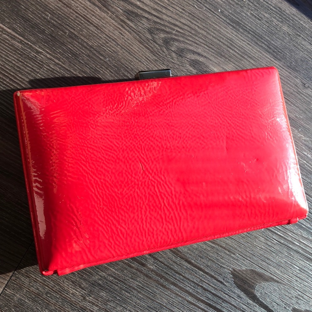 Pinkish red clutch purse